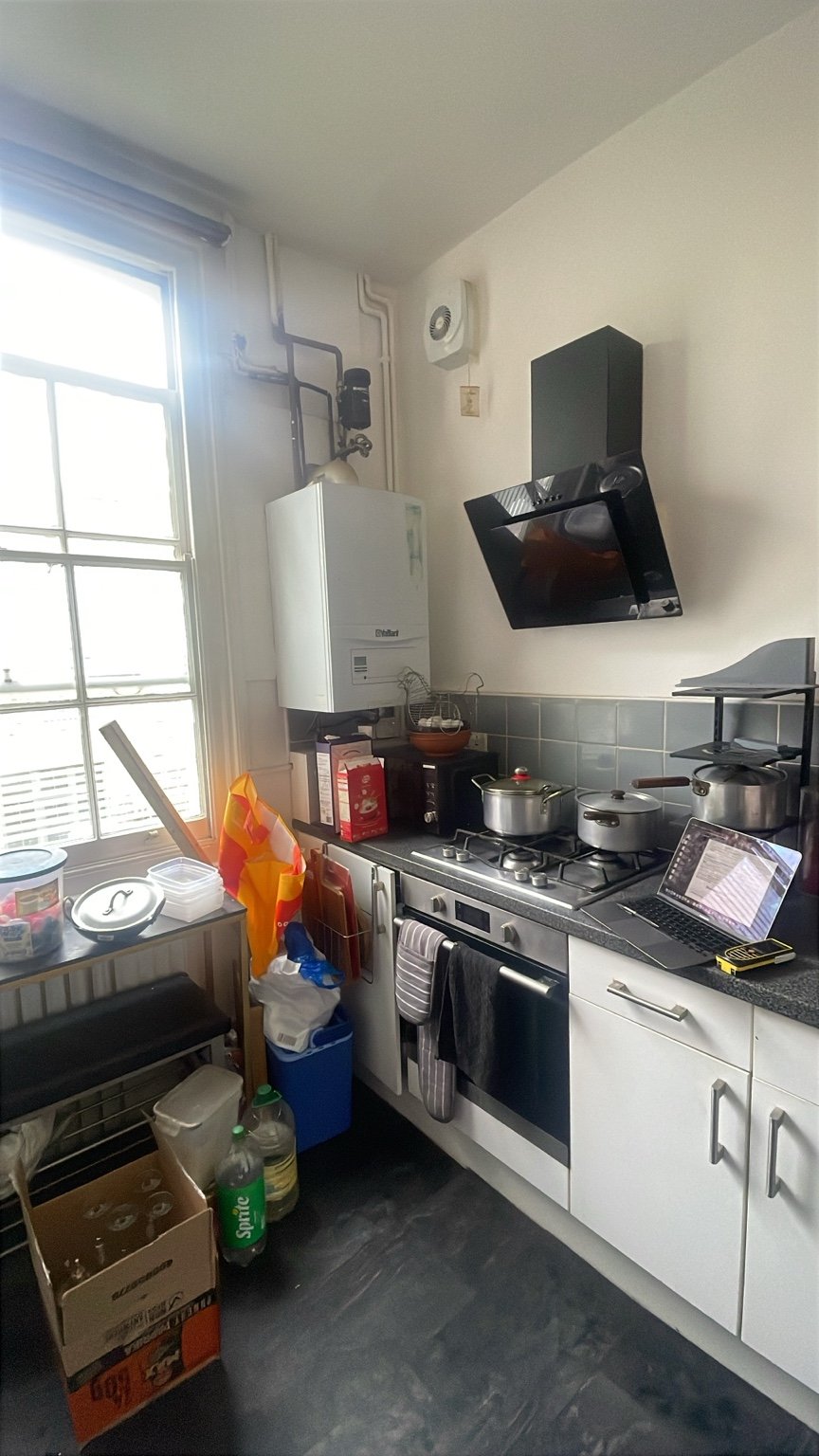 Home survey: the original cooking area before refurbishment.